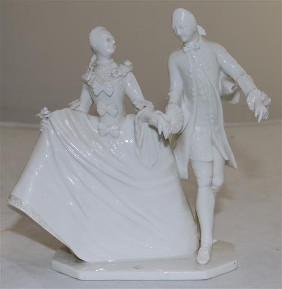 A Nymphenburg white glazed porcelain group of a lady and gentleman, after Bustelli, late 20th century, height 15.5cm (6.1in.)